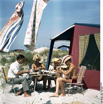 We love this picture.  It screams Outdoor Living.  Seems, for these folks, the trend started in 1970.  When life and decor were a bit simpler when it came to the Outdoor Lifestyle.  Pictured is a German family enjoying a meal "alfresco" ... Urlaub an der Ostsee.  Photo by Klaus Franke.  Used courtesy of the Creative Commons Share Alike 3.0 Germany License. (http://commons.wikimedia.org/wiki/File:Bundesarchiv_Bild_183-J0724-1007-001,_Camping_an_der_Ostsee.jpg)